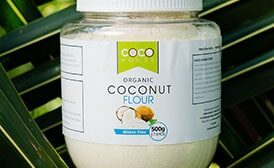 Coco House Organic Coconut Flour on Coconut Tree Branch